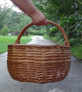 large willow basket carried by one hand